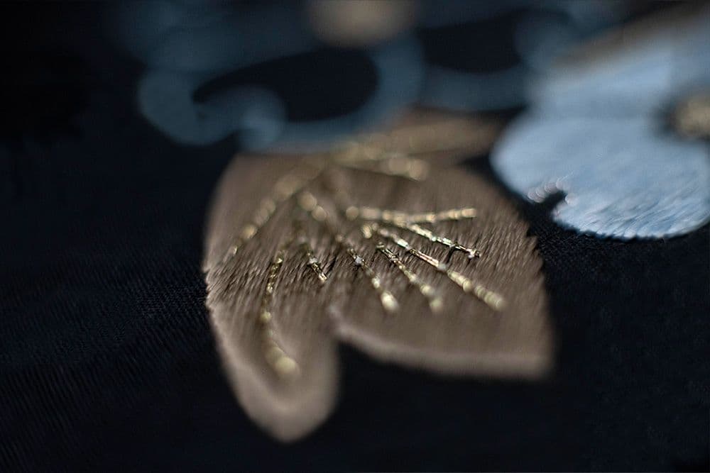 an autumn leaf embroidered with silk.jpg